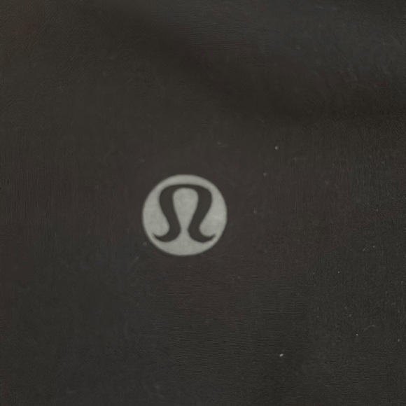 Black and white low waisted 2.5 speed up Lululemon shorts. - Picture 3 of 3